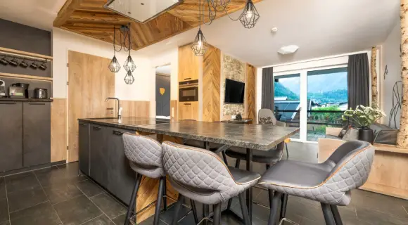 1-Bedroom suite 33–41 sqm for up to 4 ✓ kitchenette ✓ balcony ✓ Kaprun ✓ sauna & infrared ► Book now!