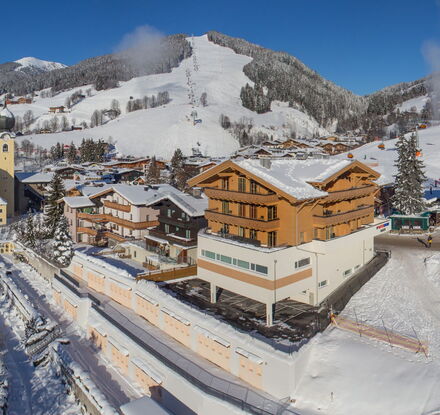 Außenansicht der Bolodges Apartments Saalbach Winter