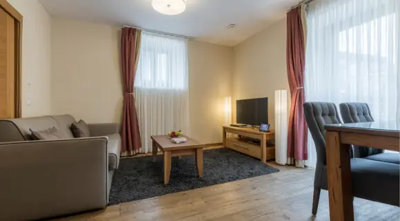 Standard Suite 50–55 m² für bis zu 4 ✓ Terrasse ✓ sep. Schlafzimmer ✓ Frühstück ✓ Sauna ✓ Zell am See ► Buchen!